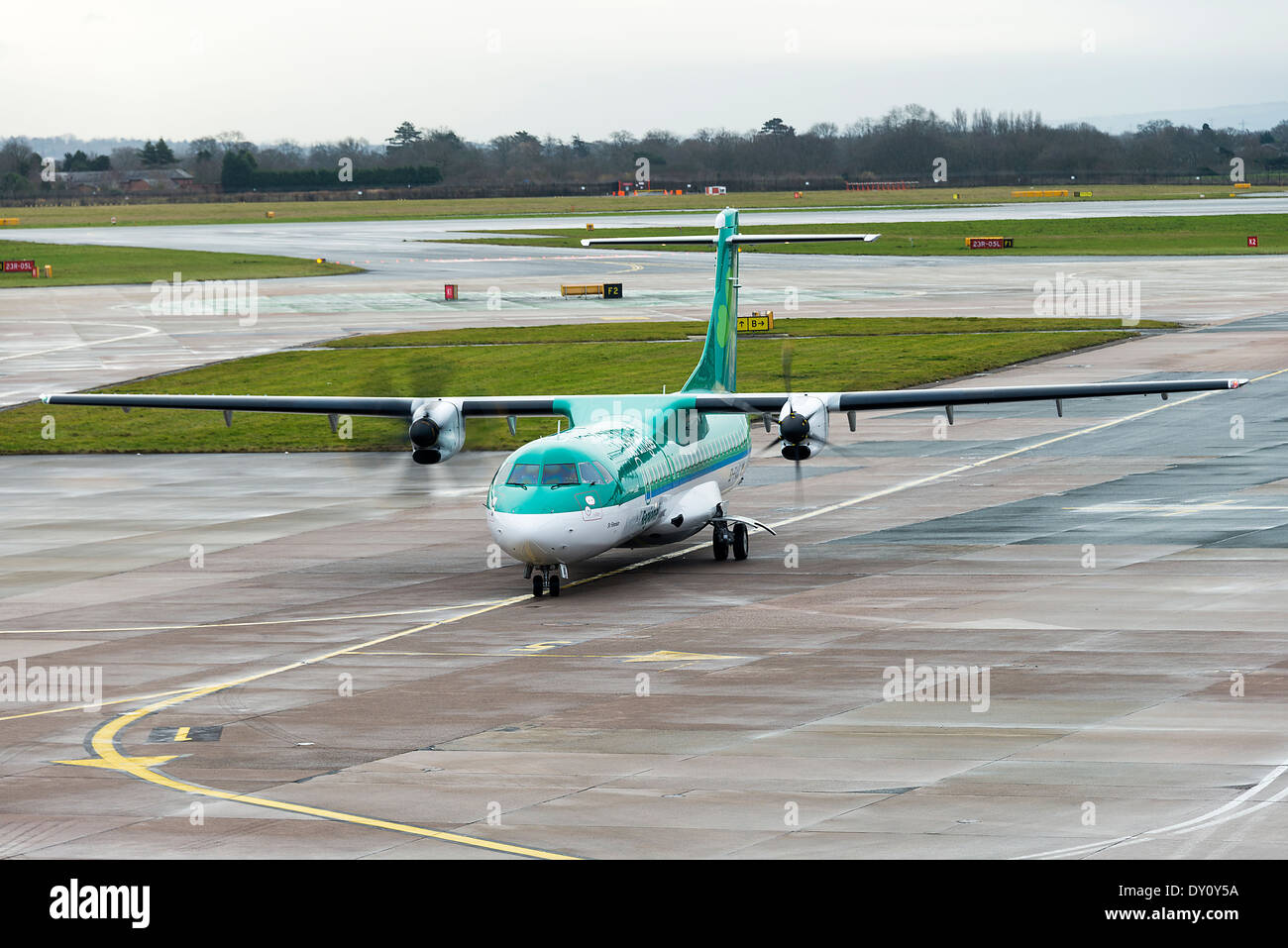 Aer Arann Operating in Aer Lingus Regional Airlines Colours ATR 72-600 Airliner EI-FAX Taxiing at Manchester Airport England UK Stock Photo