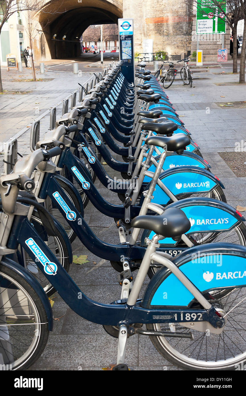 Bicycles For Rent in a Station near Tower Bridge in aLondon Tourist Area England United Kingdom UK Stock Photo
