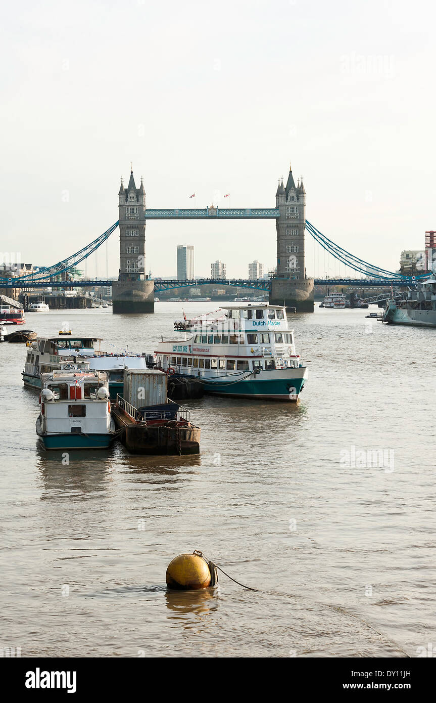 Tower Bridge and The River Thames From The North Bank near Dark House Walk with HMS Belfast London England United Kingdom UK Stock Photo