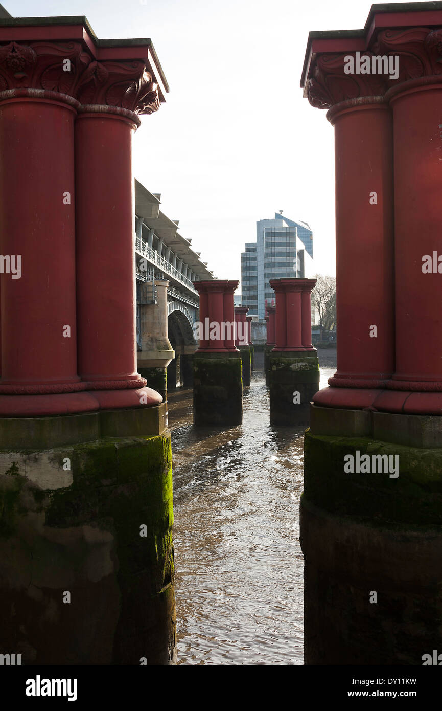 The Old Remaining Red Pillars of the Former Blackfriars Railway Bridge with The New Arched Structure Behaind London England UK Stock Photo
