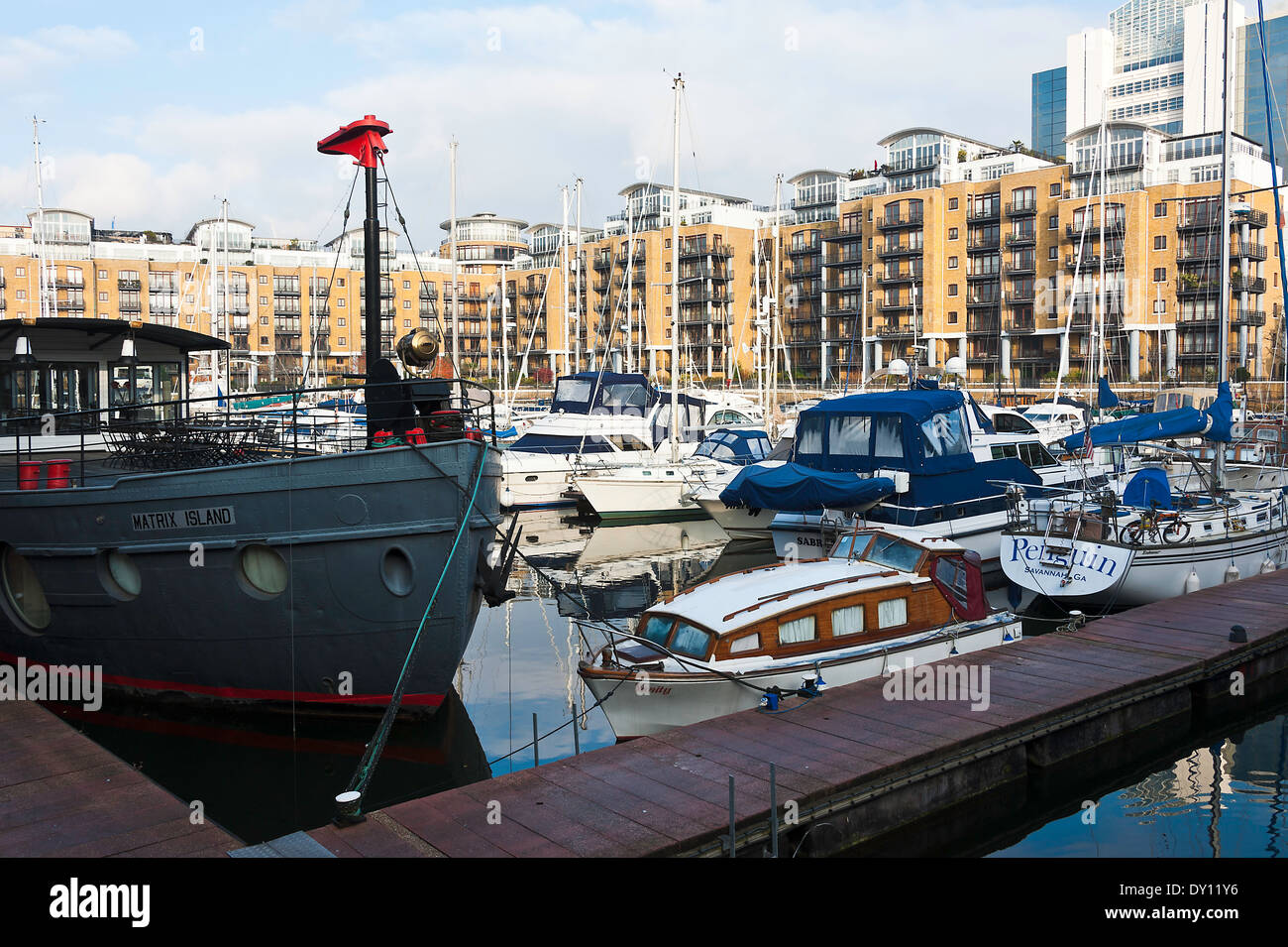 Boats and Pleasure Craft Moored in Marina Development Area at St Katharine Docks by Tower Hamlets London England United Kingdom Stock Photo