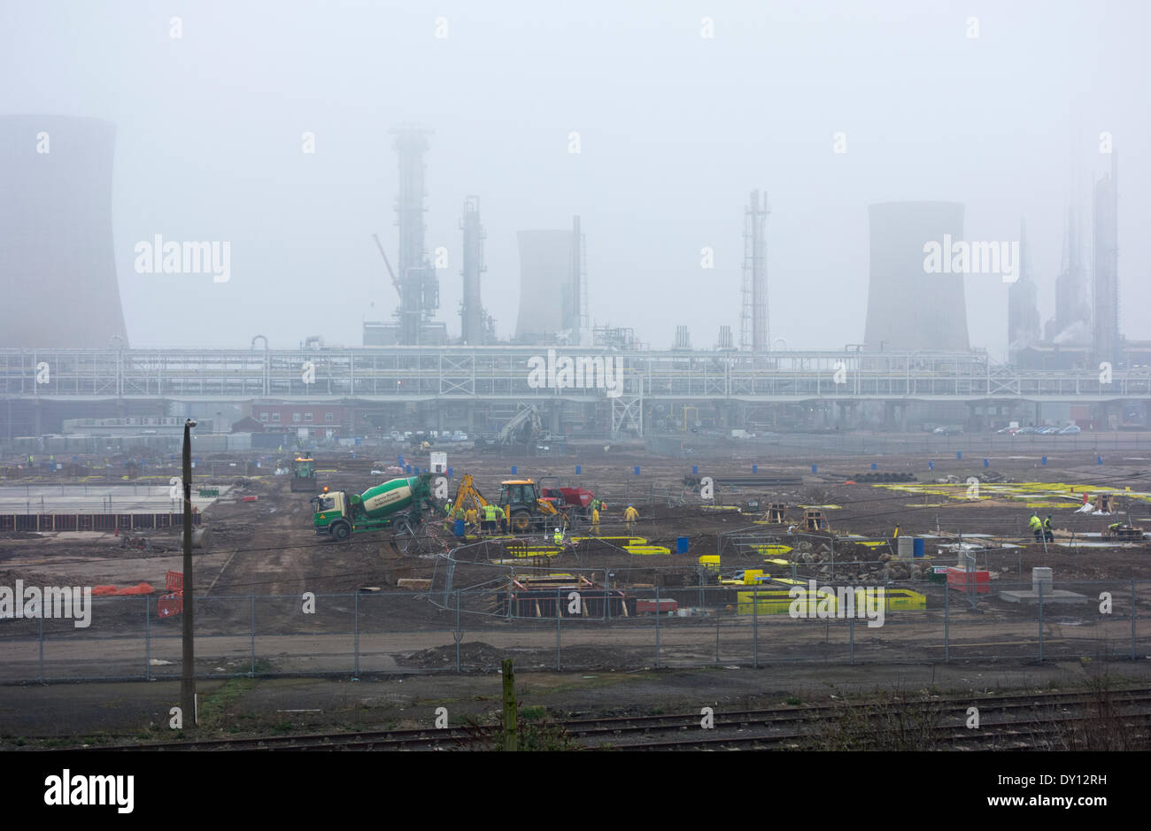 Billingham, England, UK. 2nd April 2014.  Haze and low cloud over chemical plant construction site in Billingham, north east England. Pollution level are on the rise the next couple of days. The poor air quality is creating a haze over much of England. Credit:  ALANDAWSONPHOTOGRAPHY/Alamy Live News Stock Photo