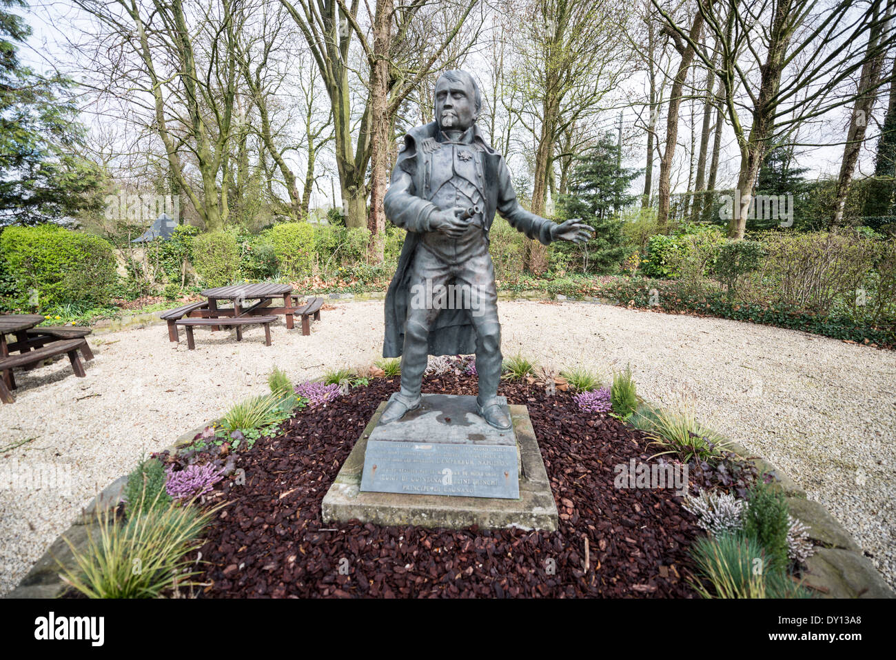 A statue of Napoleon Bonaparte in the garden at the farmhouse known as Ferme du Caillou. Next to the field where the Battle of Waterloo took place in 1815, the farmhouse is famous as the place where Napoleon spent the night before the battle. It is now a museum. Stock Photo