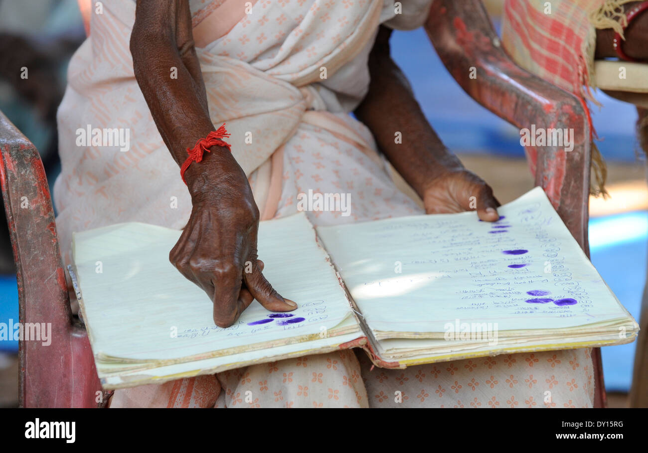 INDIA Jharkhand, NGO Birsa organize Adivasi to fight for their land rights, meeting in village, tribal women sign with thumb print, Scheduled Tribe Stock Photo