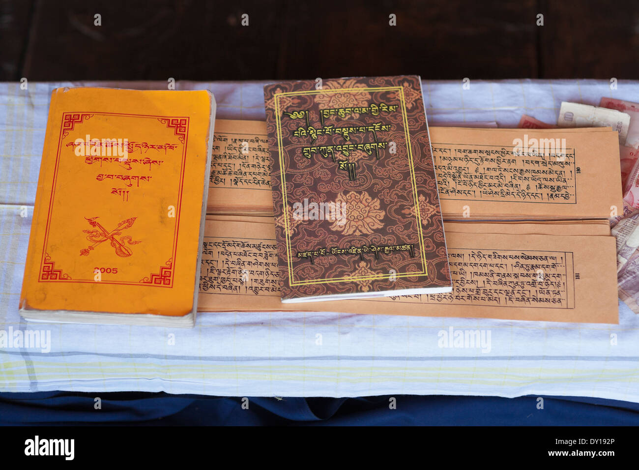 Thiksey, Ladakh, India. Tibetan Buddhist prayer books on a table at