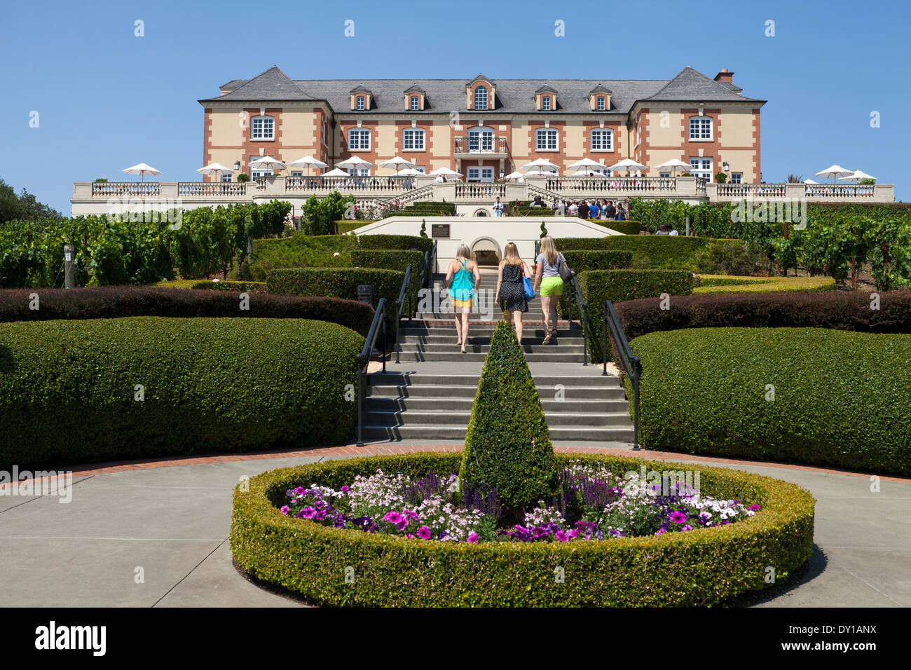 Female tourists walking up the stairs to the Domaine Carneros winery, Napa Valley, California, USA Stock Photo