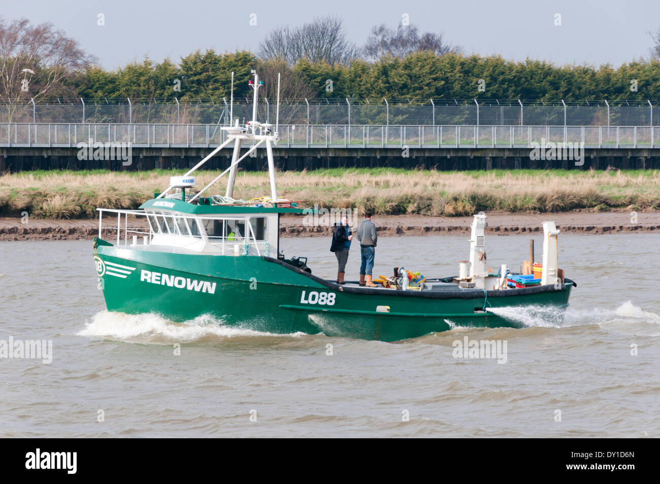 The cockle dredger Renown travelling up the River Great Ouse to King's Lynn in Norfolk. Stock Photo