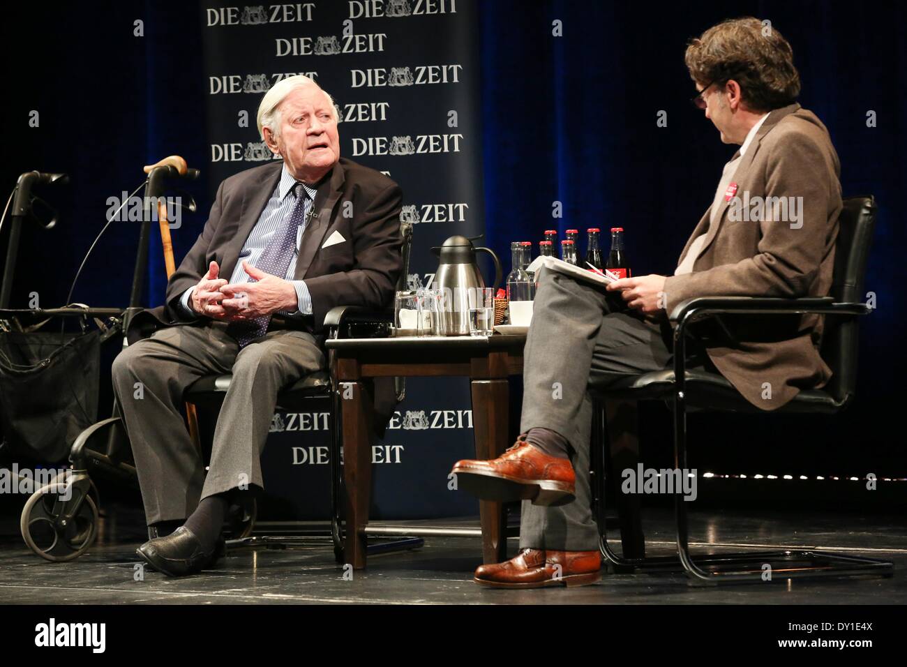 Hamburg, Germany. 02nd Apr, 2014. Former German Chancellor and co-publisher of newspaper 'Die Zeit' Helmut Schmidt (L, SPD) and editor-in-chief of 'Die Zeit' Giovanni di Lorenzo sit on the podium during the series of events 'The long night of Die Zeit' at Schauspielhaus in Hamburg, Germany, 02 April 2014. The former German Chancellor answered collected readers' questions on Hamburg. 'Die Zeit' will for the first time be published with a local section for Hamburg on 03 April 2014. Photo: BODO MARKS/DPA/Alamy Live News Stock Photo