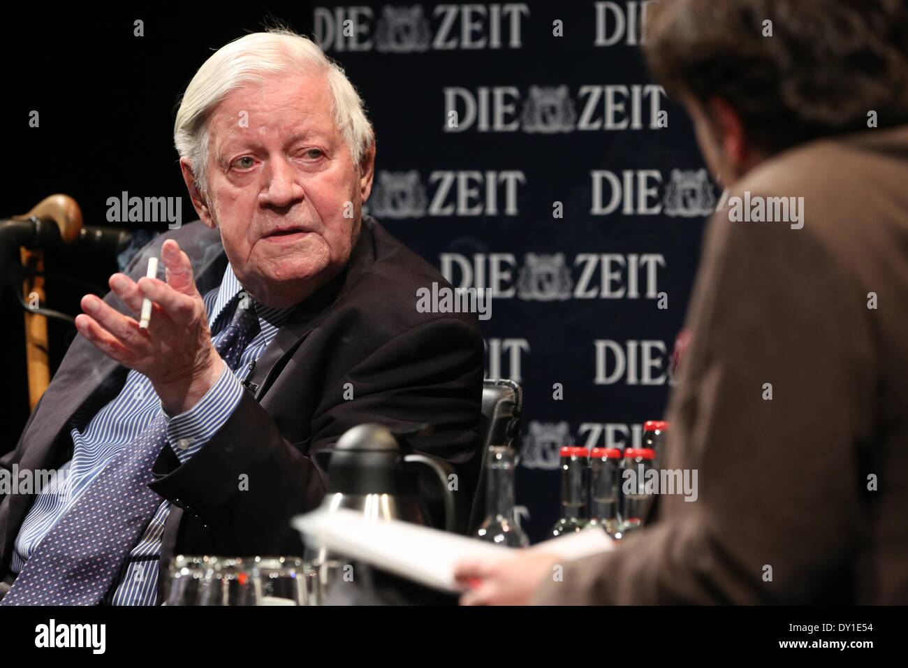 Hamburg, Germany. 02nd Apr, 2014. Former German Chancellor and co-publisher of newspaper 'Die Zeit' Helmut Schmidt (L, SPD) and editor-in-chief of 'Die Zeit' Giovanni di Lorenzo sit on the podium during the series of events 'The long night of Die Zeit' at Schauspielhaus in Hamburg, Germany, 02 April 2014. The former German Chancellor answered collected readers' questions on Hamburg. 'Die Zeit' will for the first time be published with a local section for Hamburg on 03 April 2014. Photo: BODO MARKS/DPA/Alamy Live News Stock Photo