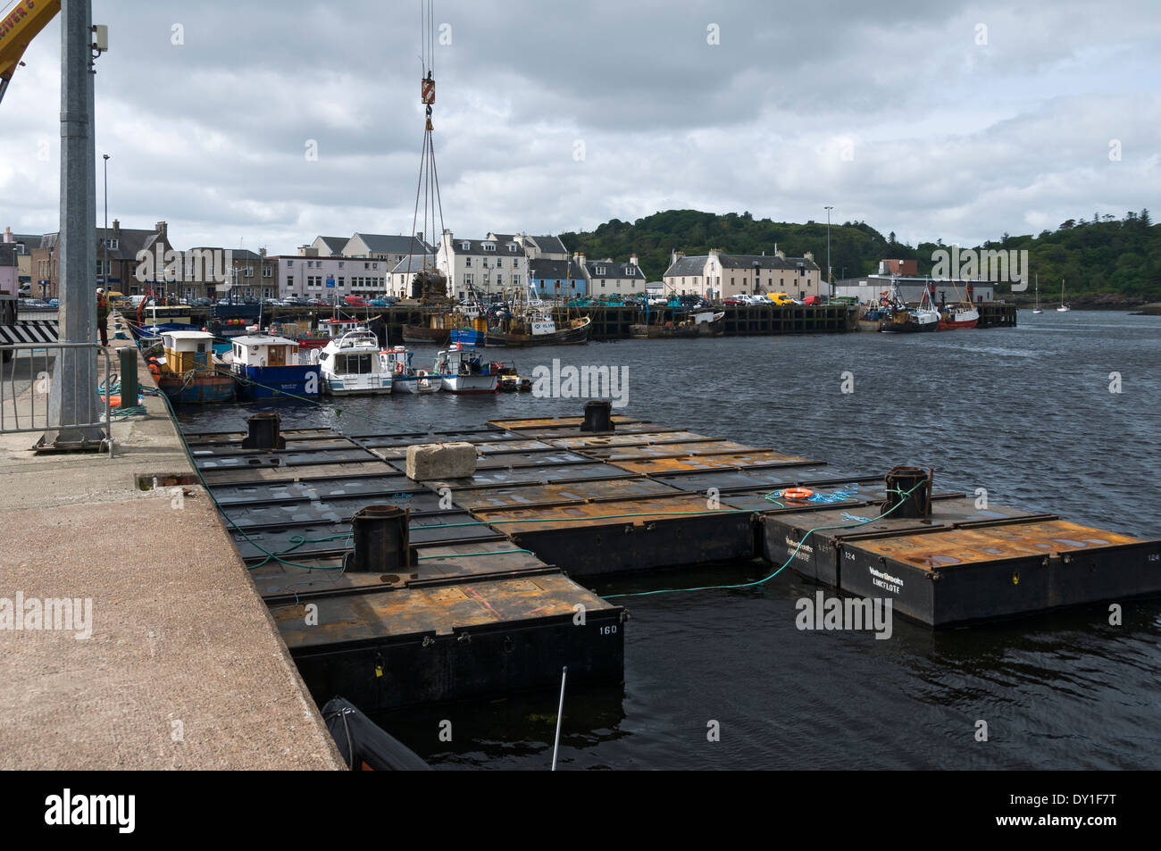 Floating steel tanks at the harbour, Stornoway, Isle of Lewis, Western Isles, Scotland, UK Stock Photo