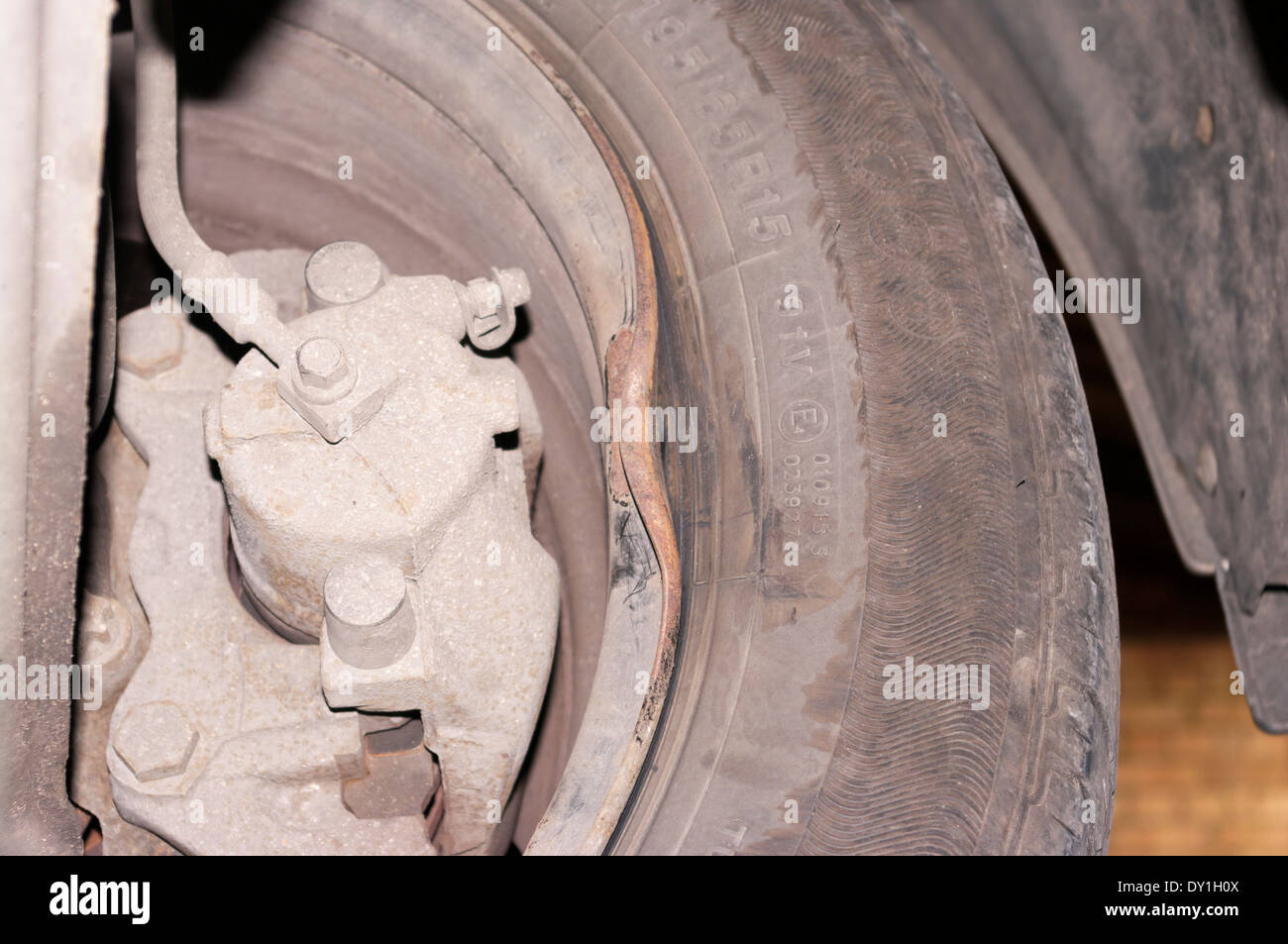Damaged Car Wheel Rim caused By A Pothole Stock Photo Alamy