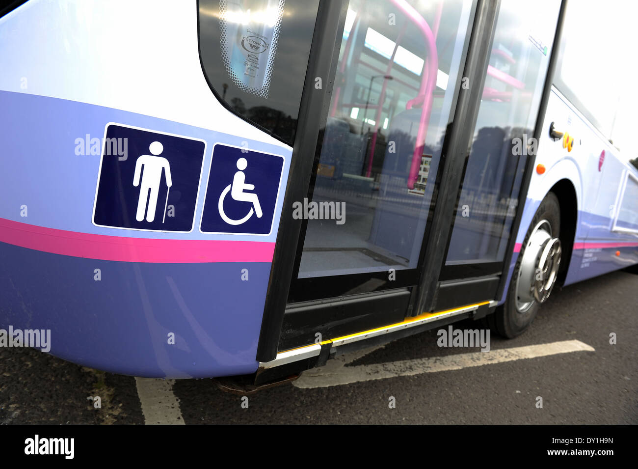 Disabled bus access, public transport bus that lowers to allow access for disabled people and wheelchairs, UK Stock Photo