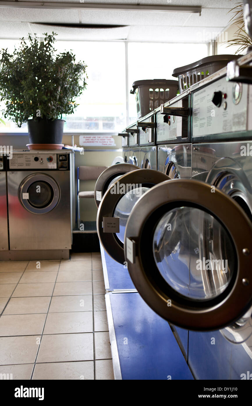 unused washing machines in a launderette Stock Photo Alamy