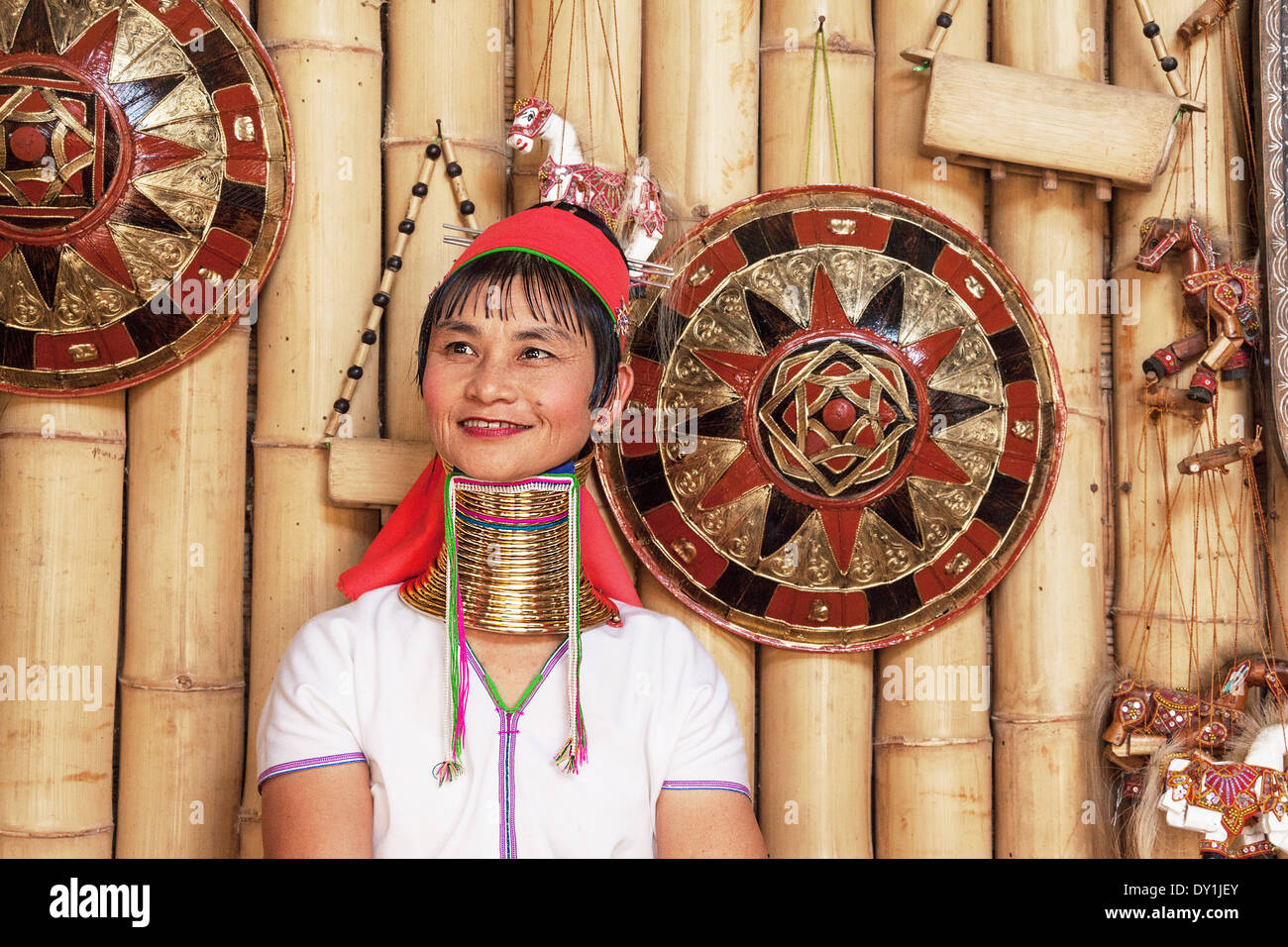 Unidentified Padaung (Karen) tribe woman poses for the camera in Nyaungshwe. Stock Photo
