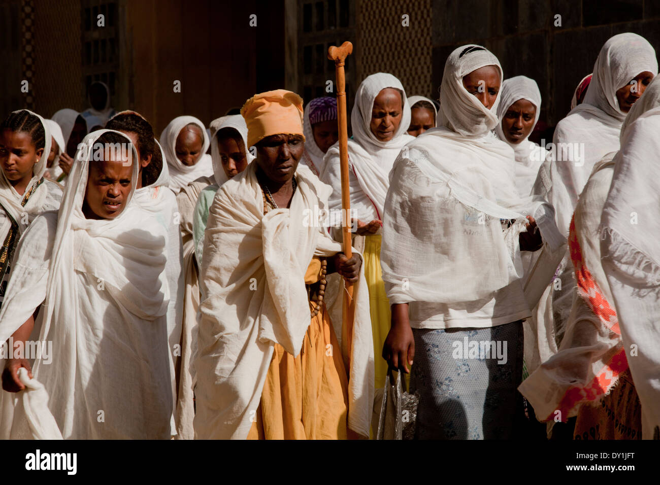 African Ethiopian congregation devotees in white Shawls Priest Stock Photo