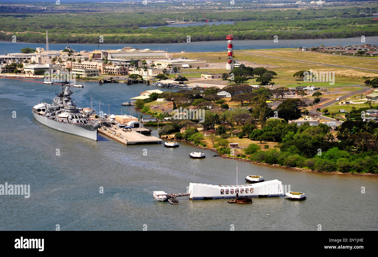 Aerial view of the USS Arizona Memorial the Battleship Missouri Memorial and the Ford Island Field Control Tower March 30, 2014 in Pearl Harbor, Hawaii. The memorial marks the location of the more than 1000 Sailors and Marines killed on the battleship USS Arizona during the 1941 attack on Pearl Harbor. Stock Photo