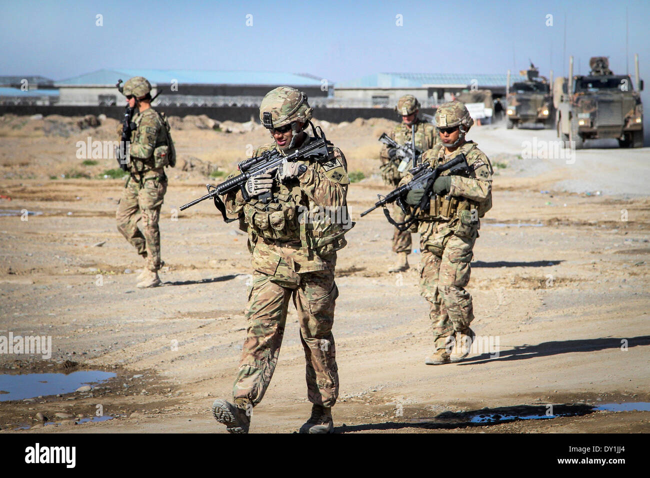 US soldiers with Forward Support Company, 65th Engineer Battalion conduct a patrol March 26, 2014 in Kandahar province, Afghanistan. Stock Photo