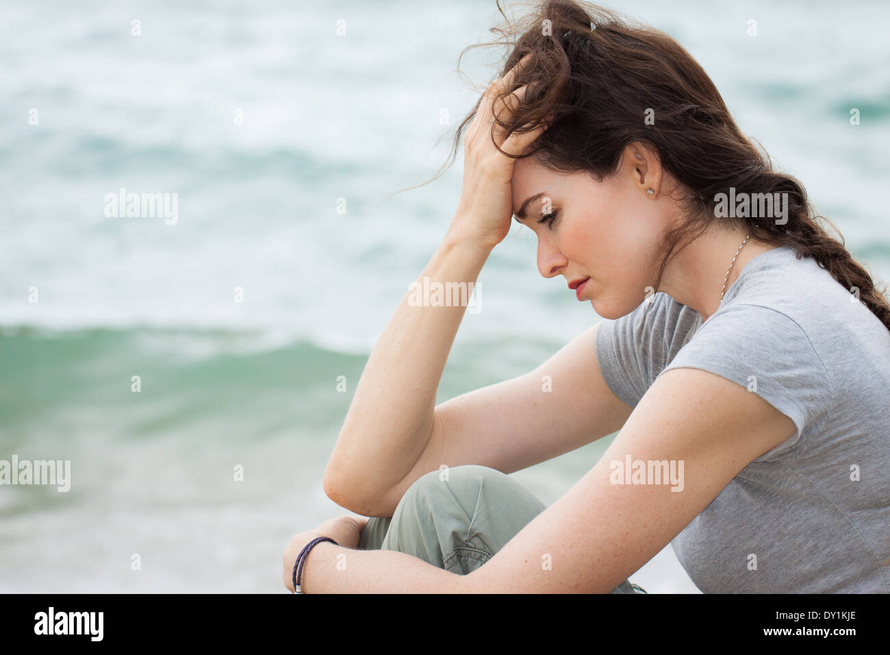 Deep thought woman ocean hi-res stock photography and images - Alamy