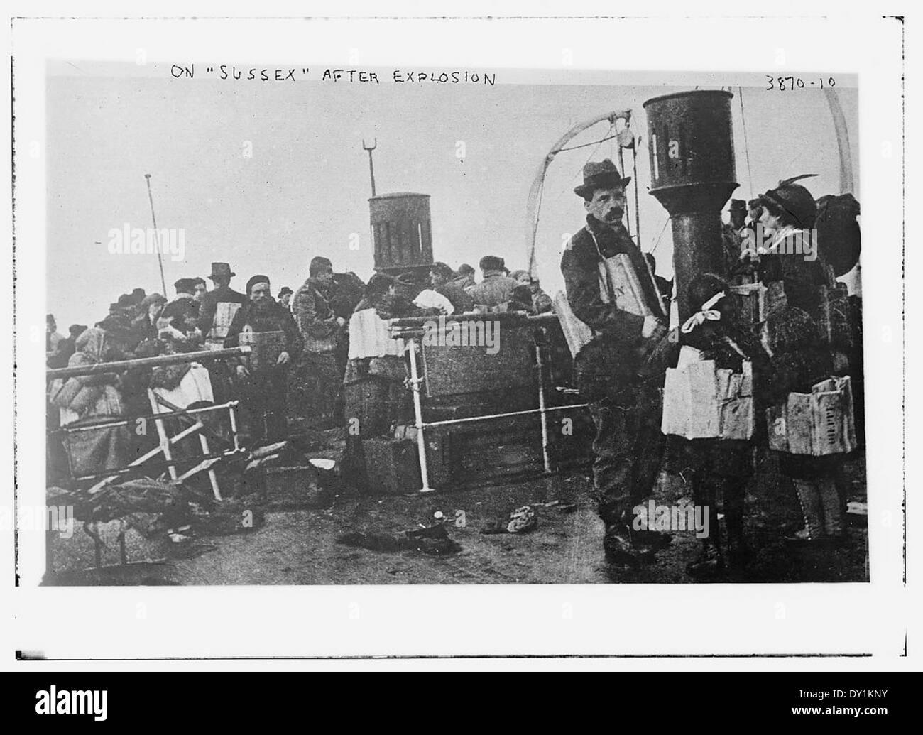 This historical photograph shows the aftermath of an explosion on the ...