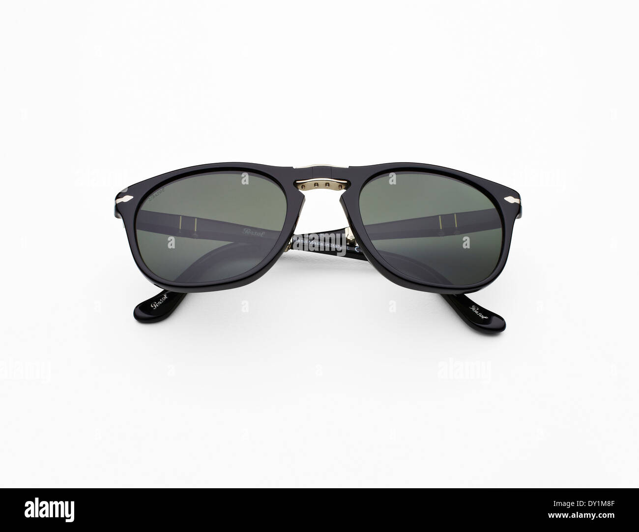 Persol folding sunglasses still life photograph against a white background  Stock Photo - Alamy