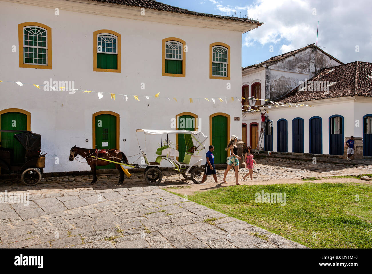 Paraty, colonial town, typical colonial houses, horse cart with tourists, Rio de Janeiro, Costa Verde, Brazil Stock Photo