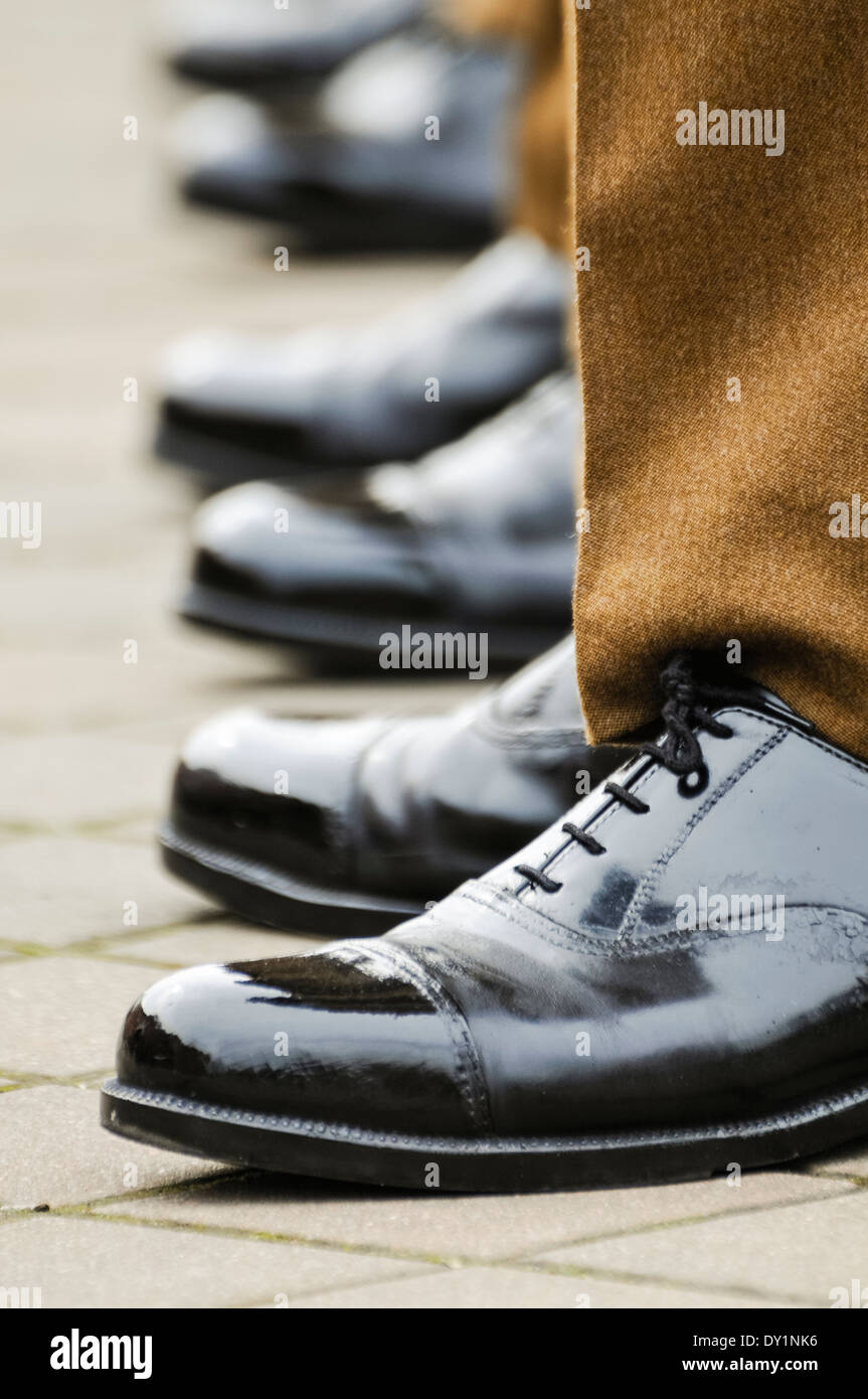 Soldiers in uniform with highly polished shoes Stock Photo Alamy