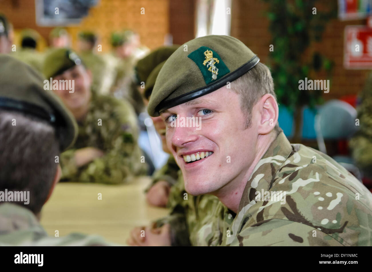 Soldier from the Royal Signals corp smiles to the camera Stock Photo