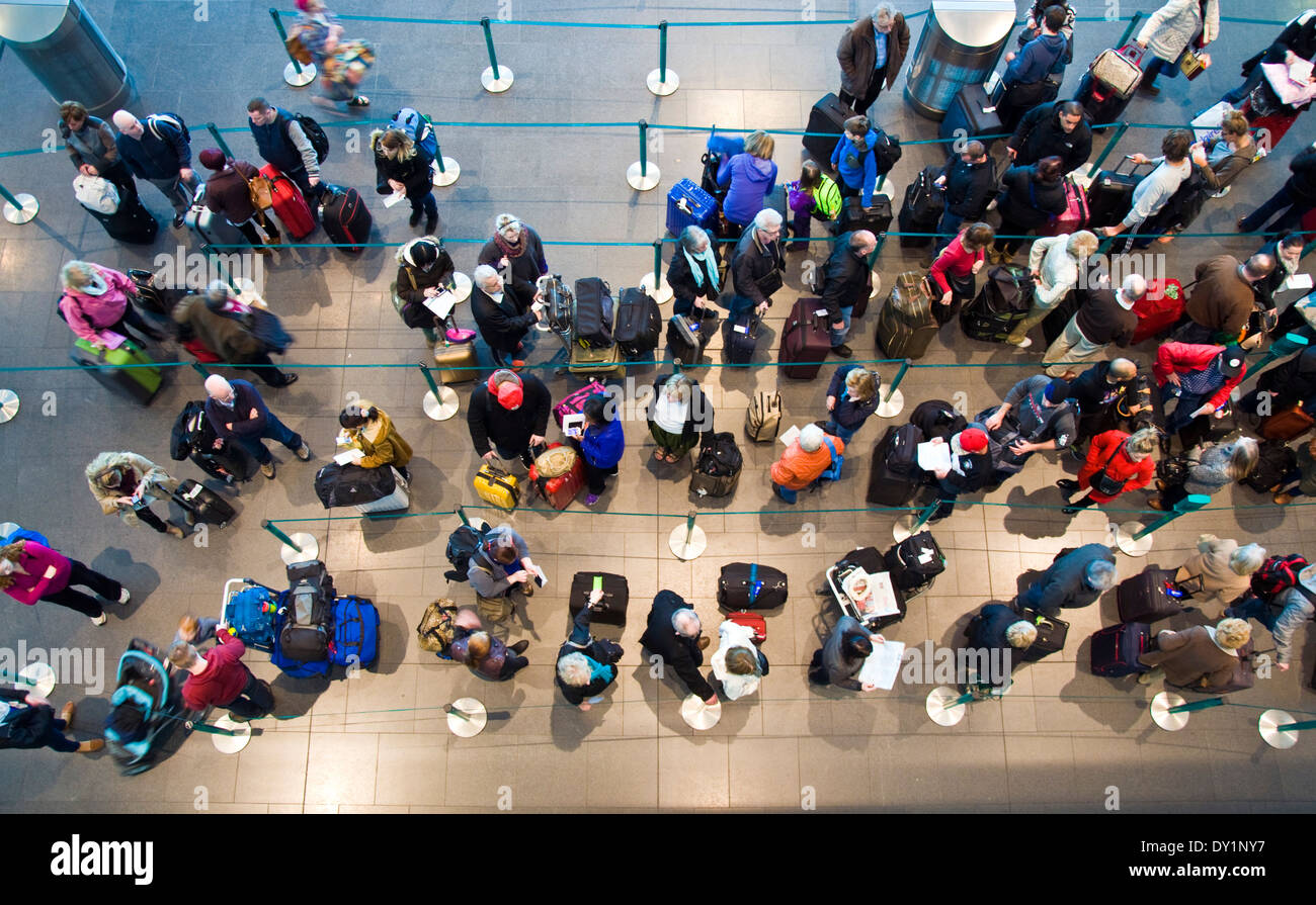 People queue to check in at Dublin airport terminal two 2 Stock Photo