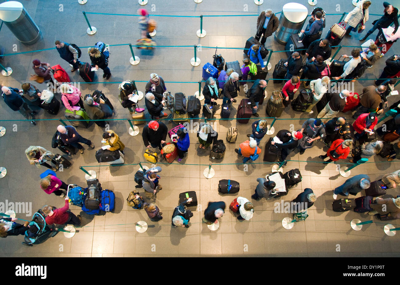 People queue to check in at Dublin airport terminal two 2 Stock Photo