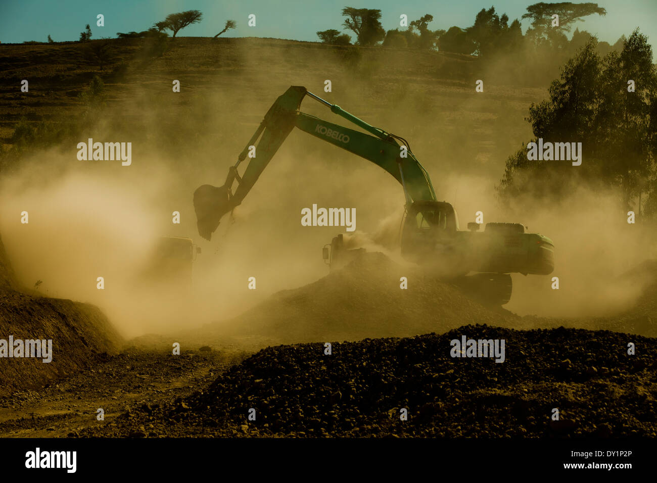 African dusty road digger Crane construction Stock Photo