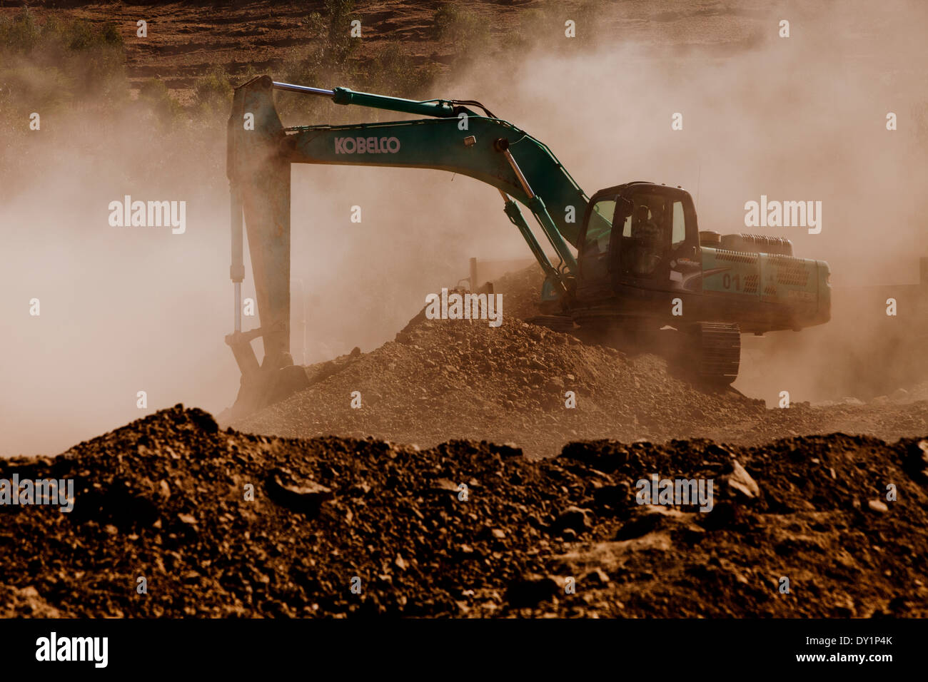 African dusty road digger Crane construction Stock Photo