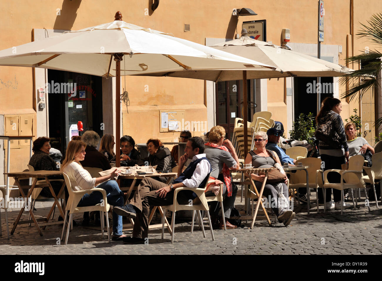 Italy, Rome, Jewish Ghetto, Via del Portico d'Ottavia, outdoor cafe Stock Photo