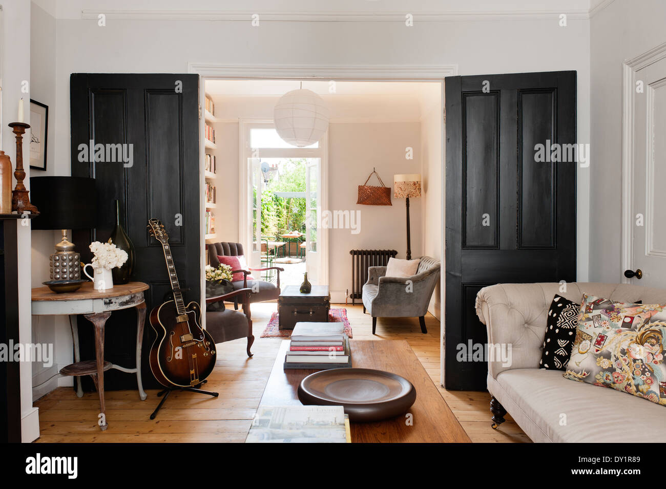 view of living room with double doors and access to garden Stock Photo