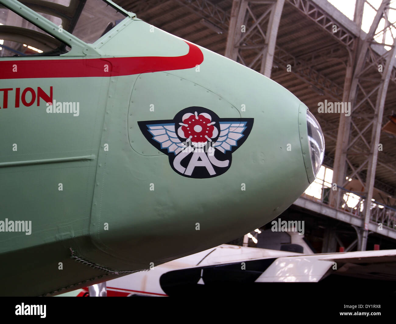 The DH89 Dragon Rapide G-AKNV is a vintage bi-plane known for its role in early passenger air travel. This aircraft was used in the 1930s and 1940s for both civilian and military purposes, offering a distinctive look with its biplane design. Stock Photo