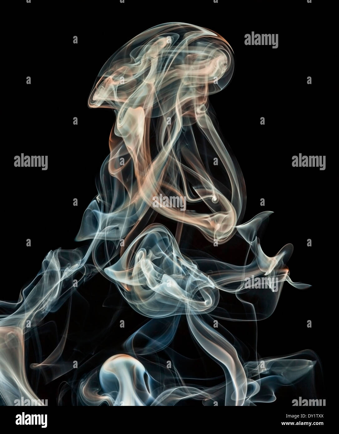 abstract colored smoke isolated on a black background Stock Photo - Alamy