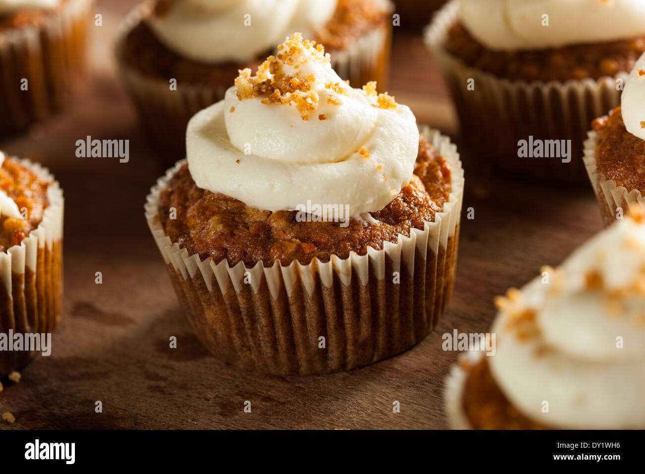 Homemade Carrot Cupcakes with Cream Cheese Frosting for Easter Stock Photo
