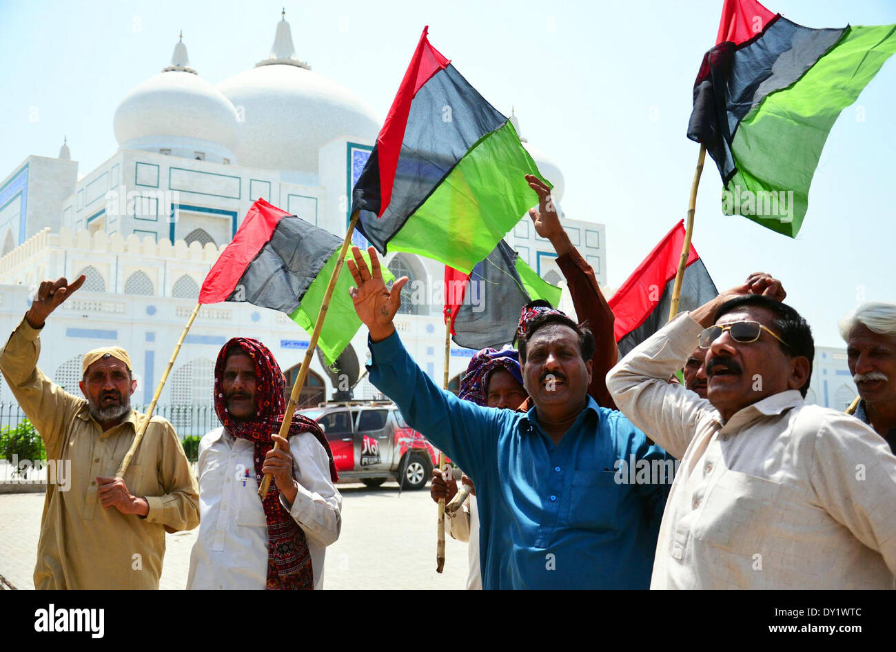 PPP activists chant slogans in front of Bhutto Mausoleum during the 35th death anniversary celebrations of PPP founder Zulfiqar Ali Bhutto, at Garhi Khuda Bux on Thursday, April 03, 2014. Credit:  Asianet-Pakistan/Alamy Live News Stock Photo