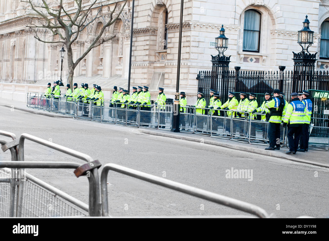 British Police Lining Up During Protestation Stock Photo