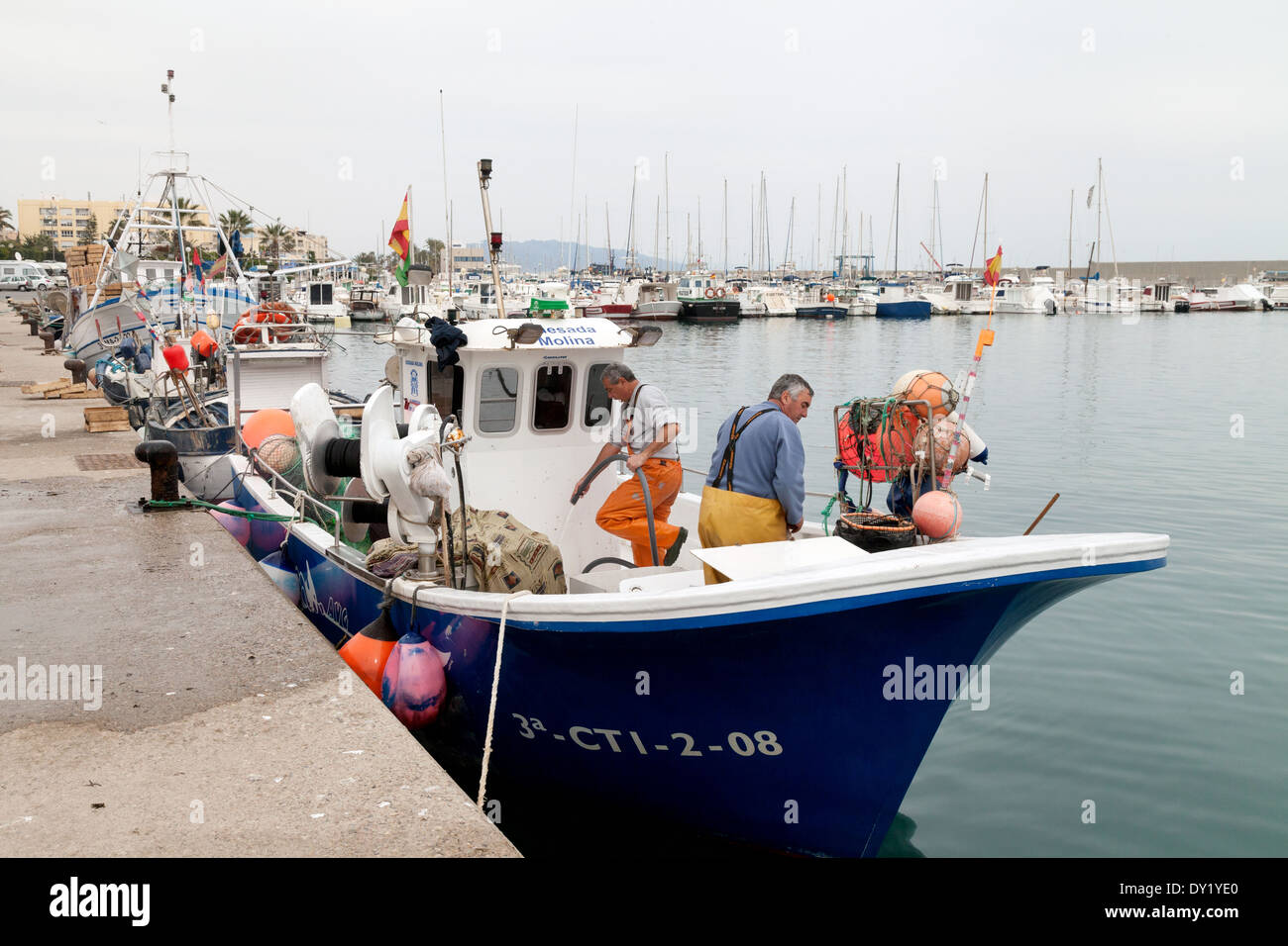 Mediterranean fishermen on their fishing boat, Harbor of Garrucha, Almeria Andalusia Spain, Europe Stock Photo