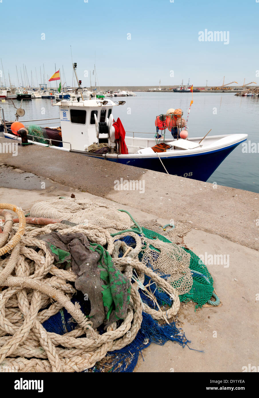 A fishing boat and nets in the port, the town of Garrucha on the mediterranean sea coast, Almeria Andalusia Spain Europe Stock Photo