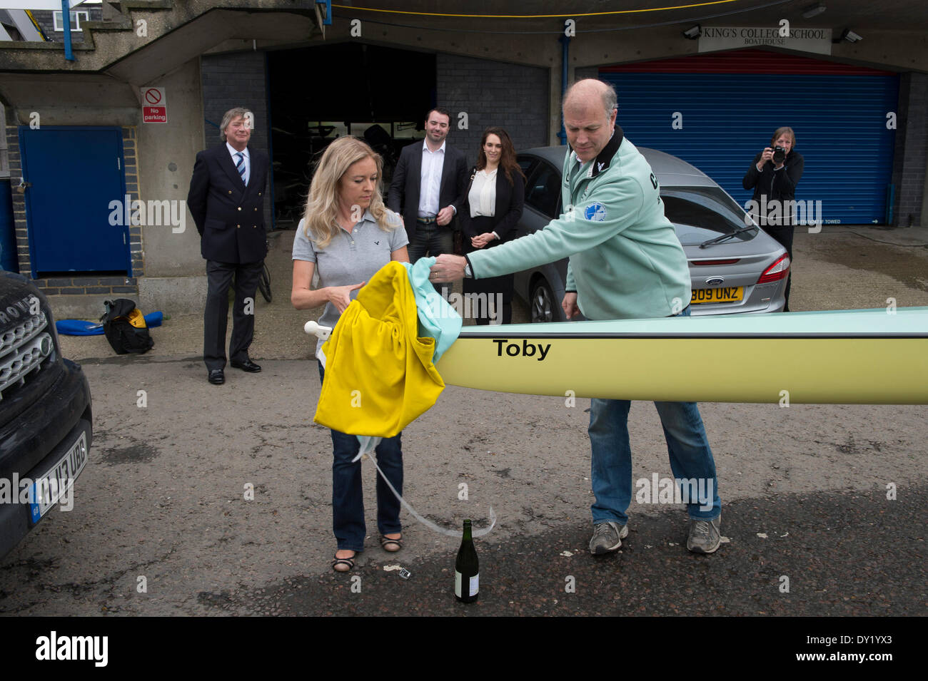 London, UK. 3rd April 2014. Cambridge University Boat Club boat naming ceremony during Tideway Week - the lead-up to the Universities Boat Race on Sunday 6 April 2014. CUMC's new 2014 Blue boat has been named in memory of CUBC member and Old Blue Toby Wallace. On 2 July 2013 Toby, at the age of 36, was killed when struck by a lorry during a charity bicycle ride from Land's End to John O'Groats. During 2012 he had rowed the Atlantic on behalf of charity. He left behind a wife of ten years Claire, who is pictured making a moving speech. Credit:  Action Plus Sports Images/Alamy Live News Stock Photo