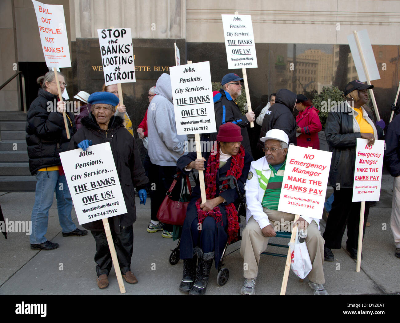 Detroit, Michigan, USA. 1st April 2014. Hundreds of Detroiters, retired pensioners and unionists picketed the federal courthouse in Detroit to object to the corporate ‘plan of adjustment’ filed by Detroit’s emergency manager Kevyn Orr and his corporate law firm Jones Day on behalf of Michigan Governor Rick Snyder. Credit:  Daymon Hartley/Alamy Live News Stock Photo