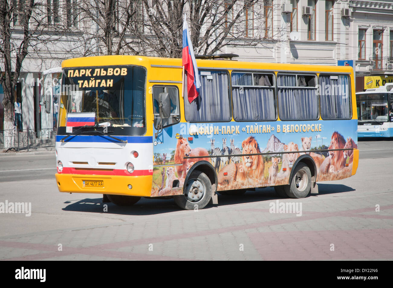 So called self-defense troops bus on Lenin square, Simferopol, Crimea. The vehicle was a gift from Taigan Lion Park in Belogorsk Stock Photo