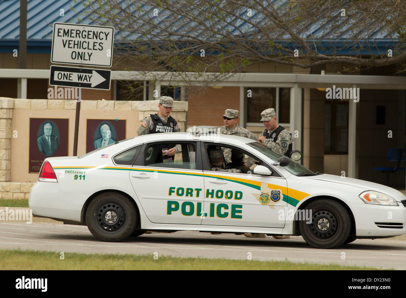 Military police on foot talk to MP in car while on duty at Fort Hood Army  Post in Killeen, Texas Stock Photo - Alamy