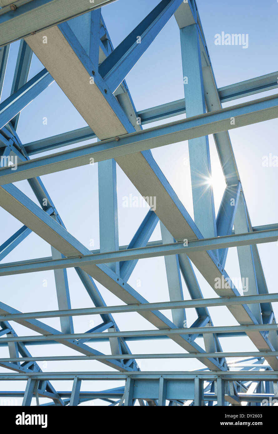 New residential construction home metal framing against a blue sky Stock Photo