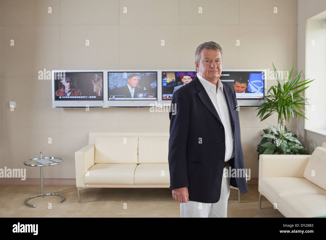 Tony Burman, Managing Director of Al Jazeera English (2008 - 2010) stands for a portrait in his office in Doha, Qatar. Stock Photo