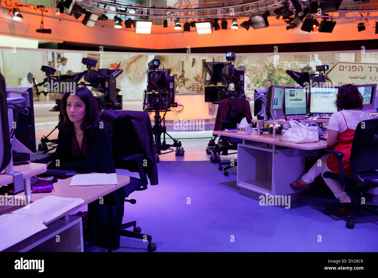 News Anchor, Maryam Nemazee prepares her material prior to going on air