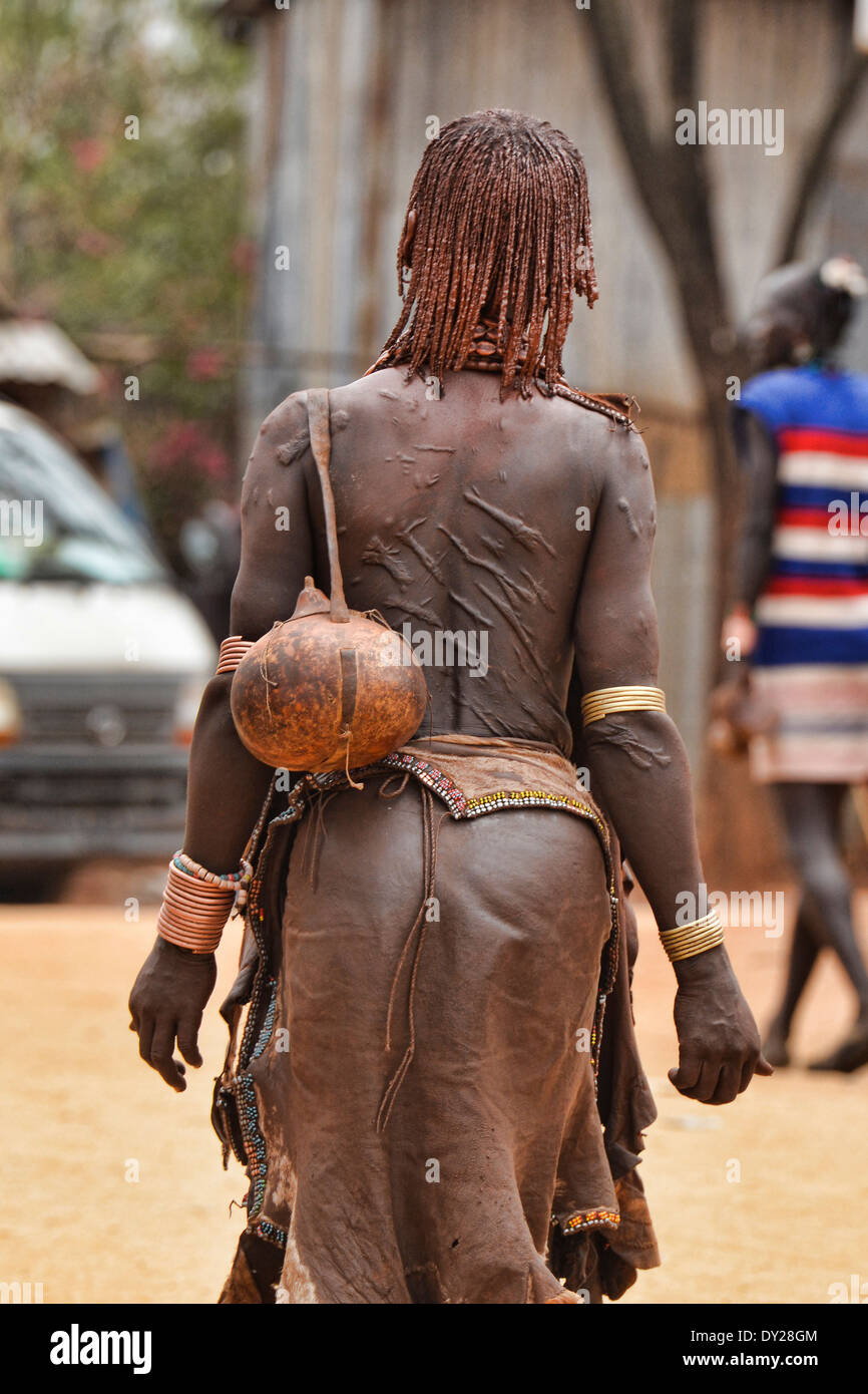 Scars on a Hamer woman's back near Turmi in the Omo Valley, Ethiopia. Women are whipped by men at bull jumping festivals. Stock Photo
