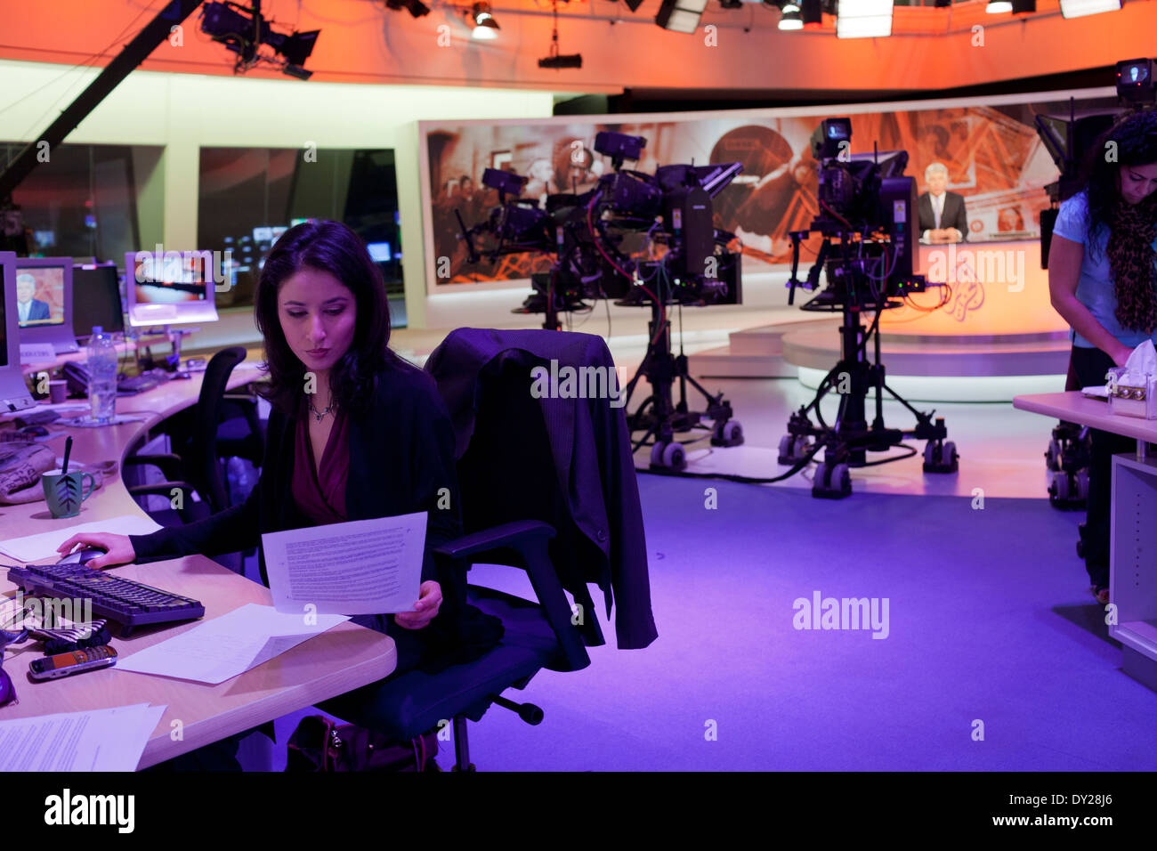 News Anchor, Maryam Nemazee prepares her material prior to going on air