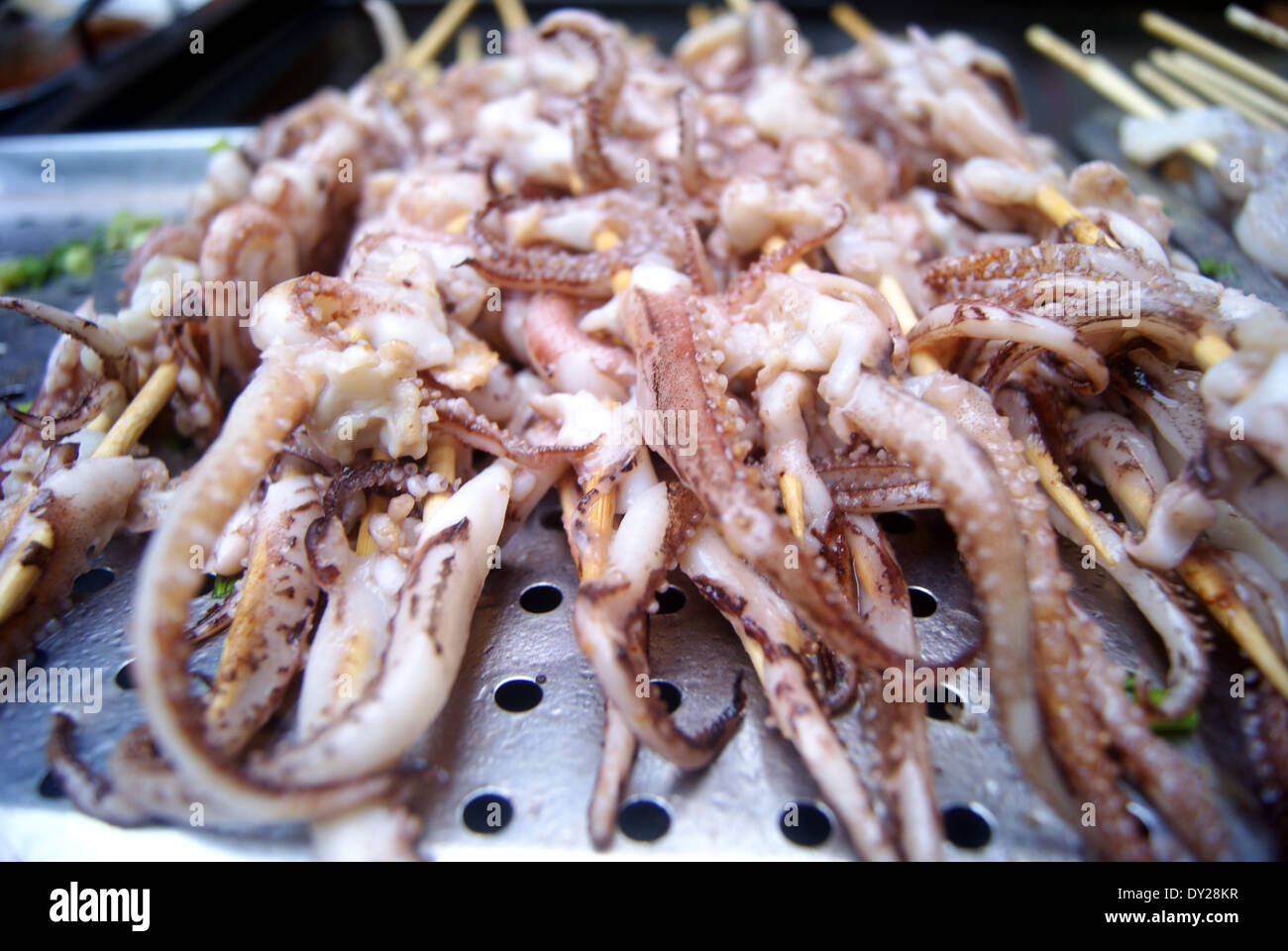 Squid barbecue hi-res stock photography and images - Alamy